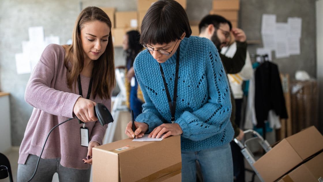 Customer service team of an e-commerce company, preparing delivery packages for customers, highlighting efficiency and attention to detail in the shipping process